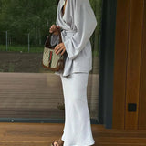 Completo da ufficio in due pezzi con gonna alla caviglia con lacci grigi