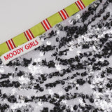 Gonna aderente con patchwork di pizzo e paillettes zebrate