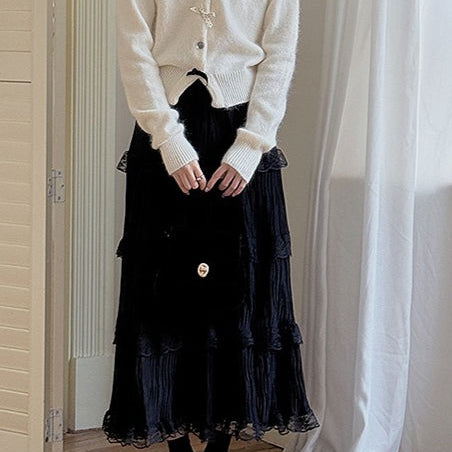 Cardigan con scollo a V, fiocco e bottoni