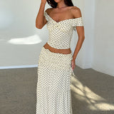 Completo gonna lunga con fiocco laterale senza spalline a pois