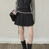 Gonna a vita alta plissettata in lana tinta unita