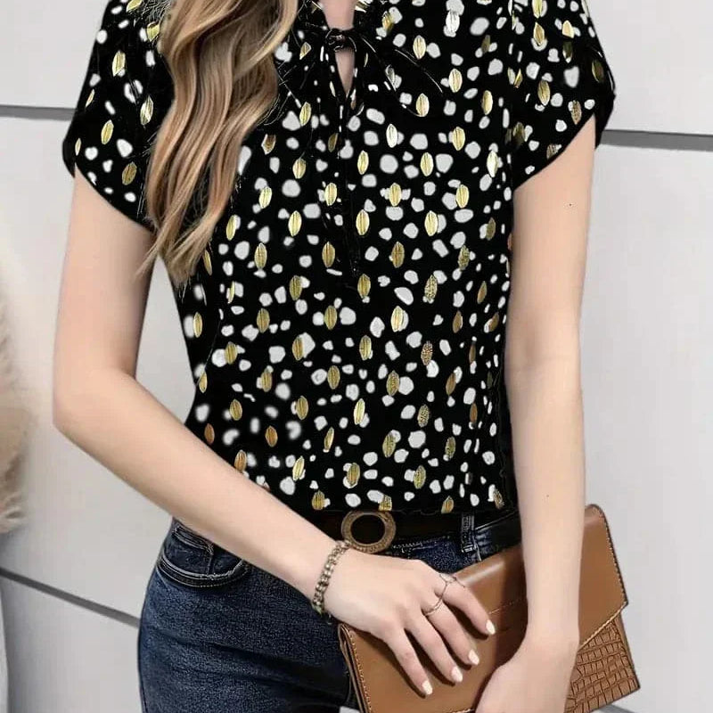 Blusa chic con pois neri e dorati - Elegante, giocosa e versatile per le donne