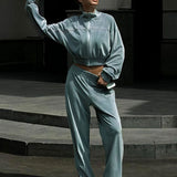 Completo sportivo in due pezzi con colletto in velluto e cerniera a maniche lunghe