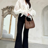 Camicetta vintage in raso con maniche a lanterna