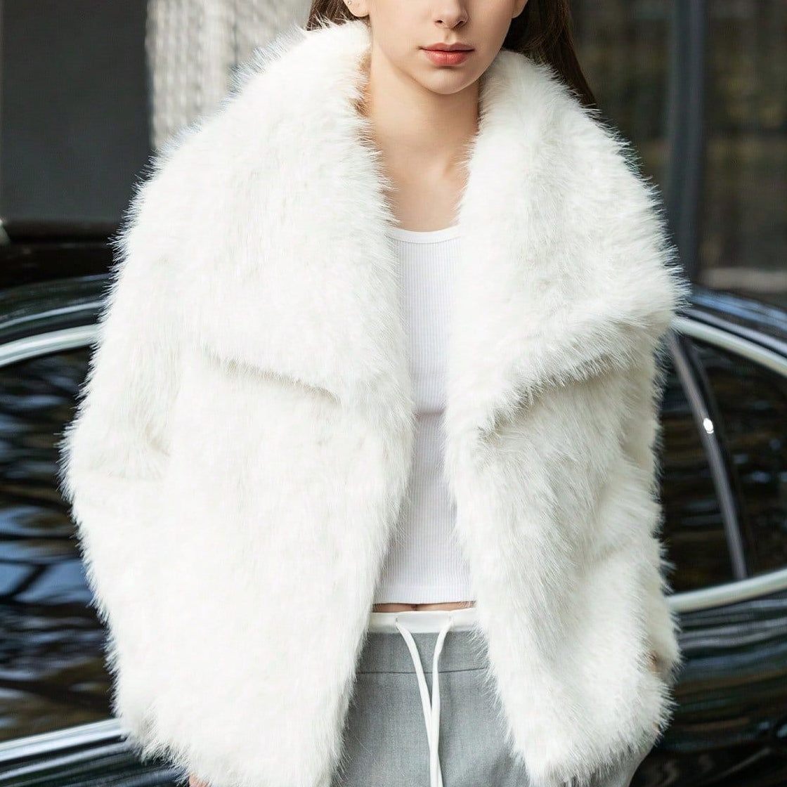 Cappotto caldo in pelliccia sintetica tinta unita con collo a tacca