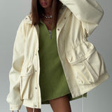 Giacca con tasca portaoggetti e coulisse in vita