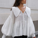 Camicetta vintage con colletto e maniche a sbuffo plissettate