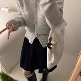 Cardigan lavorato a maglia con motivo a neve