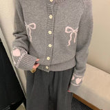 Cardigan con fiocco frontale dalla vestibilità rilassata