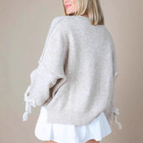 Felpa ampia con fiocco applicato in 3D