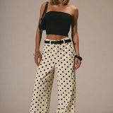 Jeans larghi a vita media con pois