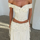 Completo gonna lunga con fiocco laterale senza spalline a pois