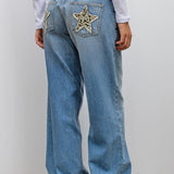 Jeans vintage con toppa a stella leopardata