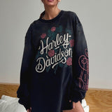 Felpa con stampa vintage di rose rovinate