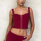 Completo gonna con pantaloncini aderenti e volant e top con bottoni automatici alla moda