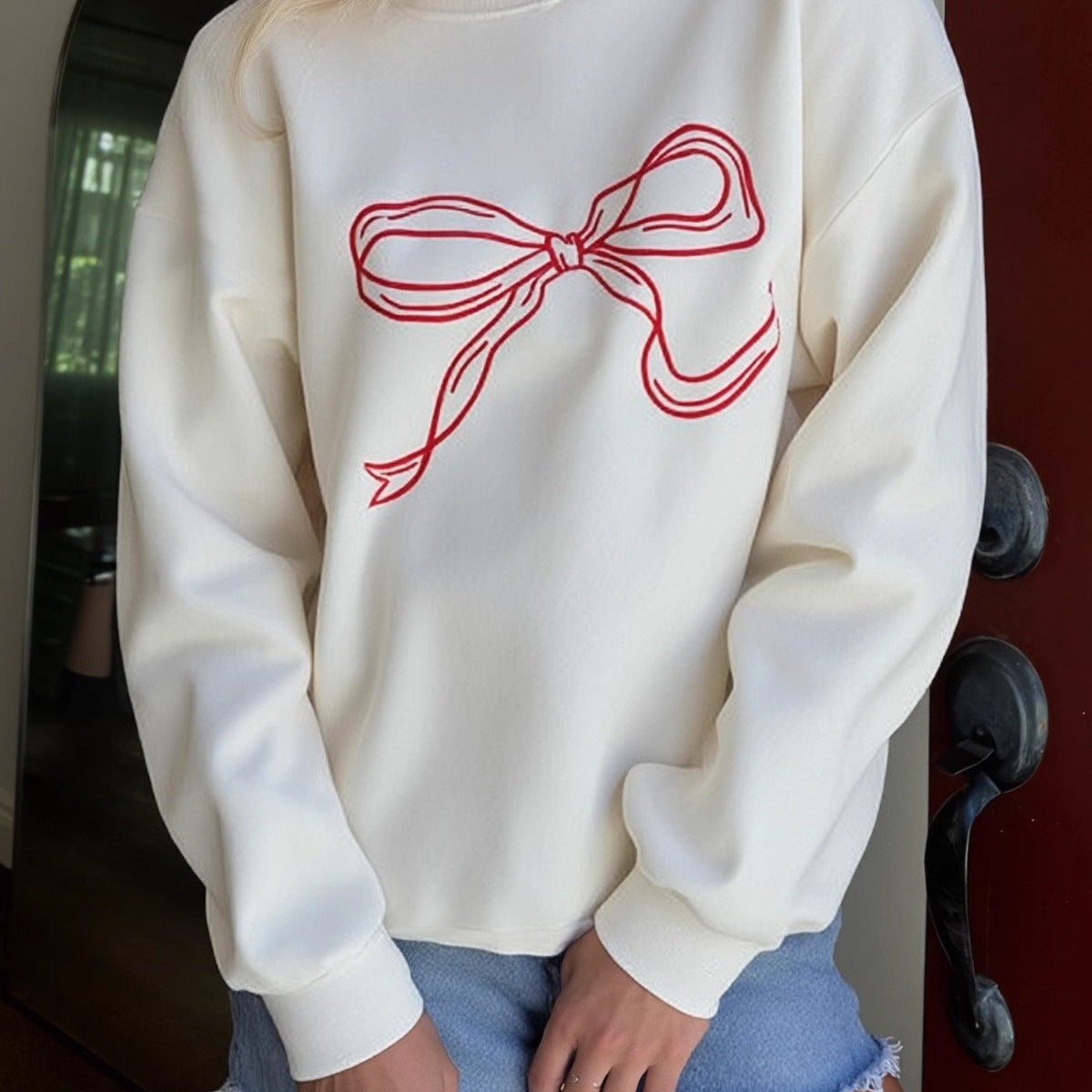 Blusa girocollo rilassata, dolce ed elegante