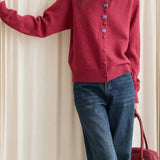 Cardigan con fibbia ricamata a scollo tondo