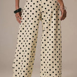 Jeans larghi a vita media con pois