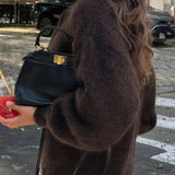 Cardigan minimalista a maniche lunghe con bottoni