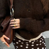 Cardigan minimalista a maniche lunghe con bottoni