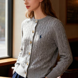 Cardigan in lana con motivo a trecce ricamato