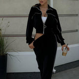 Completo sportivo in due pezzi con colletto in velluto e cerniera a maniche lunghe