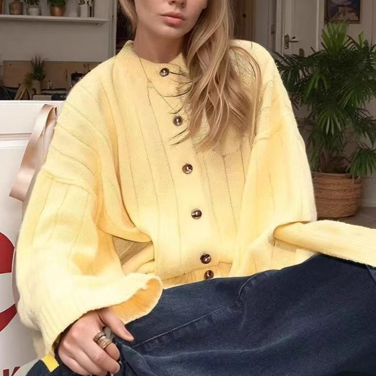 Cardigan in maglia a coste gialle con scollo rotondo