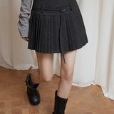 Gonna a vita alta plissettata in lana tinta unita