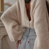 Elegante cardigan monopetto in maglia tinta unita