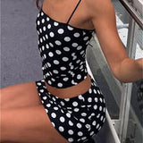 Completo due pezzi con gonna a pois senza spalline