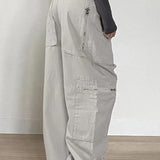 Pantaloni cargo in denim retrò a vita bassa con tasche