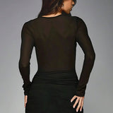 Mini abito a maniche lunghe in rete trasparente con patchwork arricciato