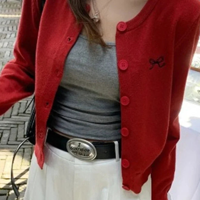 Cardigan in maglia con fiocco ricamato