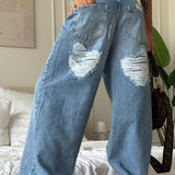 Jeans a gamba larga strappati con cuore vintage