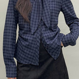 Gonna a trapezio con nappe in vita