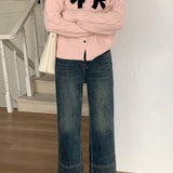 Cardigan a coste con fiocco scintillante