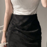 Minigonna aderente in pelle scamosciata con ruches