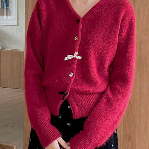 Cardigan con scollo a V, fiocco e bottoni