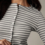 Set due pezzi con bottoni a righe e cordoncino