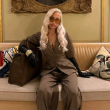 Completo da ufficio in due pezzi con blazer e pantaloni larghi e maniche a sbuffo