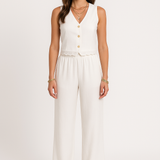 Completo da donna: gilet e pantaloni a gamba larga – taglio aderente – dettagli in pizzo – tessuto traspirante