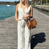 Completo da ufficio a due pezzi con gamba larga a righe in cotone e lino