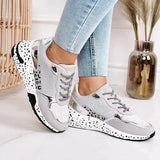 Sneakers basse da donna – Suola spessa – Stampa animalier – Dettagli riflettenti