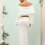 Completo due pezzi da donna: top a maniche lunghe con spalle scoperte e gonna aderente a vita alta