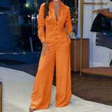 Tuta da donna – Taglio aderente – Gambe larghe – Maniche lunghe – Collo a camicia