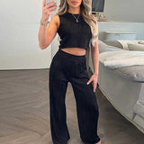 Completo due pezzi da donna: top corto aderente senza maniche, pantaloni dritti a vita alta