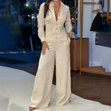 Tuta da donna – Taglio aderente – Gambe larghe – Maniche lunghe – Collo a camicia