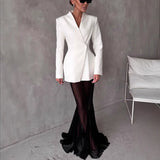 Completo da donna: blazer aderente in raso e gonna a sirena in tulle semitrasparente