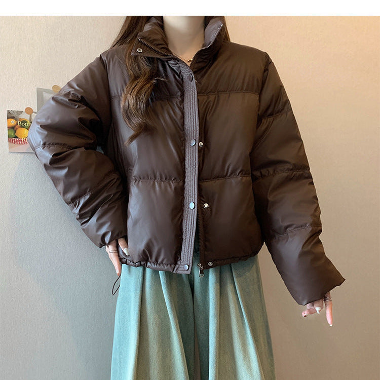 Piumino corto da donna, cerniera frontale e bottoni automatici, collo alto