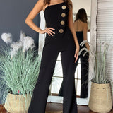 Tuta da donna – Monospalla – Taglio aderente – Pantaloni larghi e fluidi – Bottoni